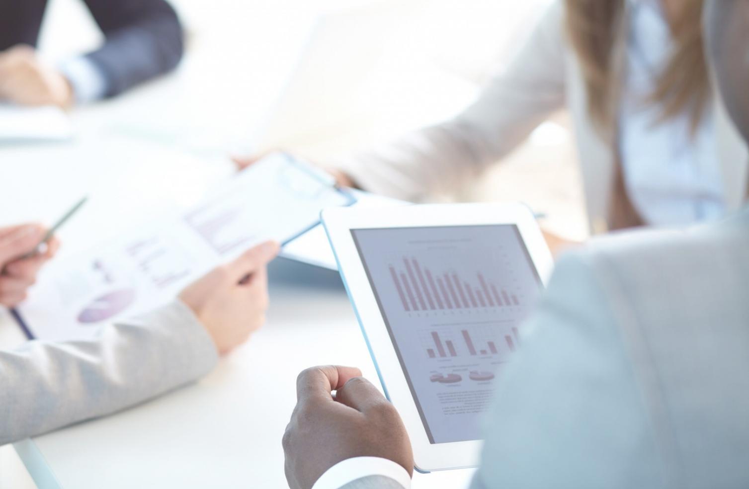 Students learning investment automation techniques